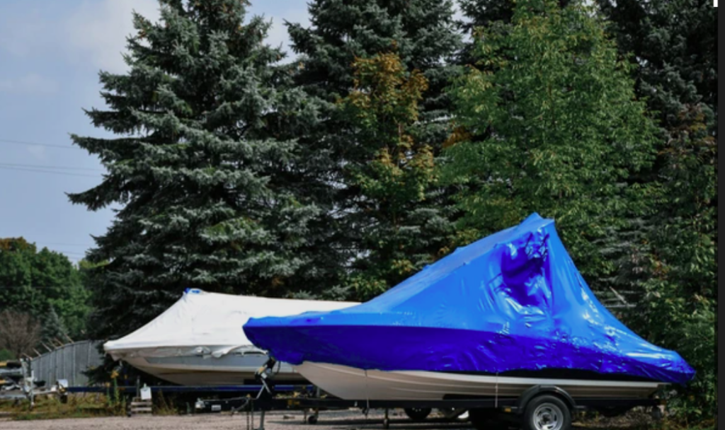 Hutch Truck Solutions boat hauling, camper hauling, junk removal, and residential snow plowing services in Southern New Hampshire